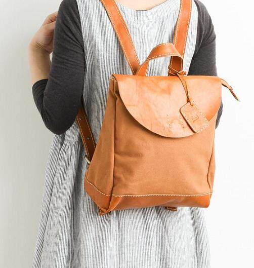 日本新款纯皮牛皮帆布竖款方形女包双肩包淑女背包学生包书包正品