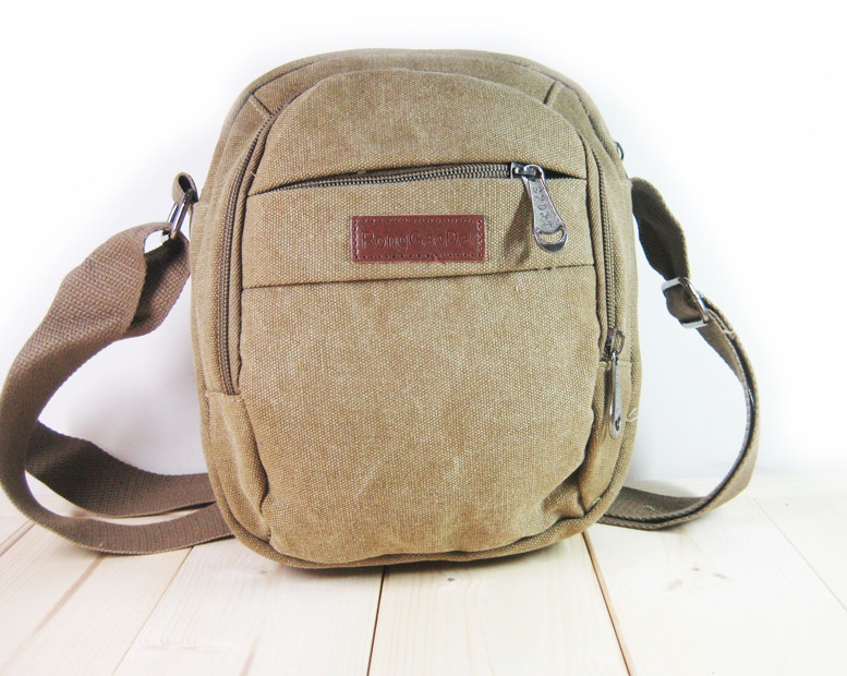 男帆布包斜挎单肩包小包男包休闲潮户外多功能实用背包竖款小跨包