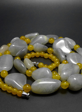 非常有特色的近一级半白油润和田玉浅墨青花籽料原石项链90A