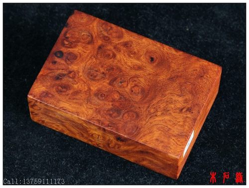 树瘤虎皮纹红木手把件缅甸花梨