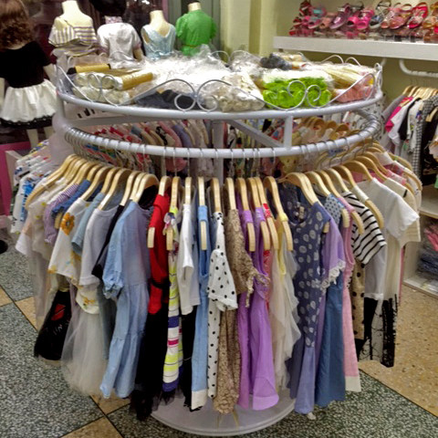 童装店中间中岛架服装圆形展示架