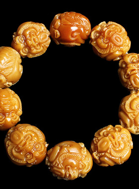 黄色风化菩提根原籽手把件文玩