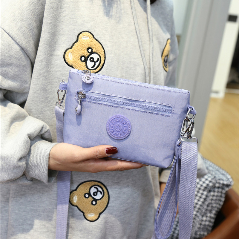 网红小布包零钱包牛津布防水w手拎包女迷你帆布斜挎小包简约手机