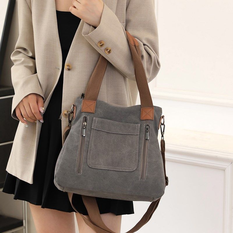 大容量帆布包包女2024新款休闲手提包百搭复古单肩包通勤斜挎包潮,箱包皮具/热销女包/男包,时尚帆布包,淘宝优惠券,粉丝福利购,淘宝优惠卷