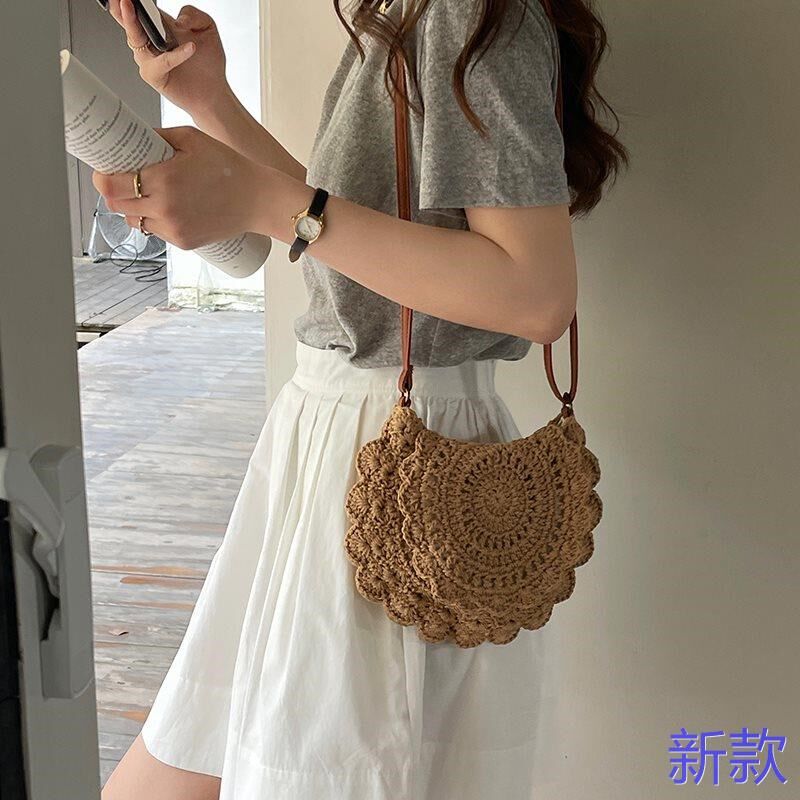 韩版斜挎镂空草编包新款花边单肩圆形草包编织包女海边度假沙新款