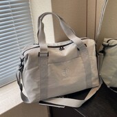 大容量手提短途旅行包女轻便防水行李包男出差收纳游泳包健身包女