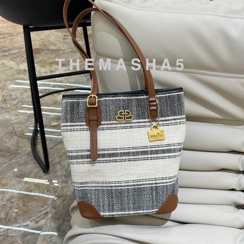 玛莎帆布包包女2024新款大容量高级感出勤单肩大包网红爆款水桶包,箱包皮具/热销女包/男包,水桶包,淘宝优惠券,粉丝福利购,淘宝优惠卷