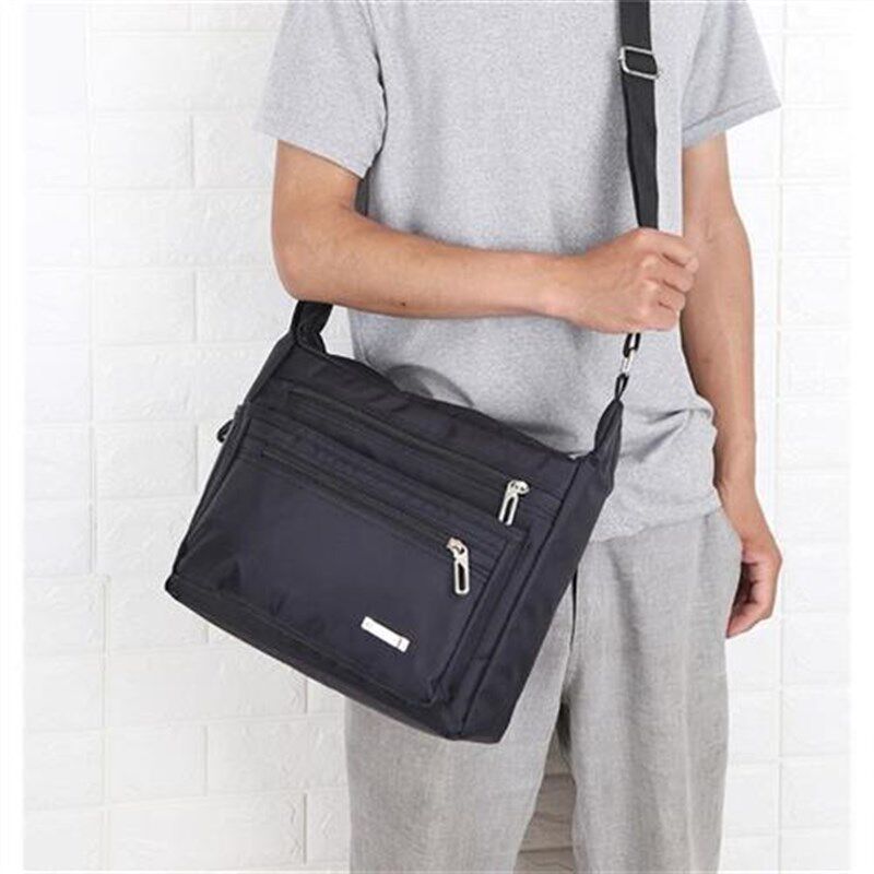 大容量单肩包男士背包牛津布斜挎包多隔层男包公文包旅行包电脑包