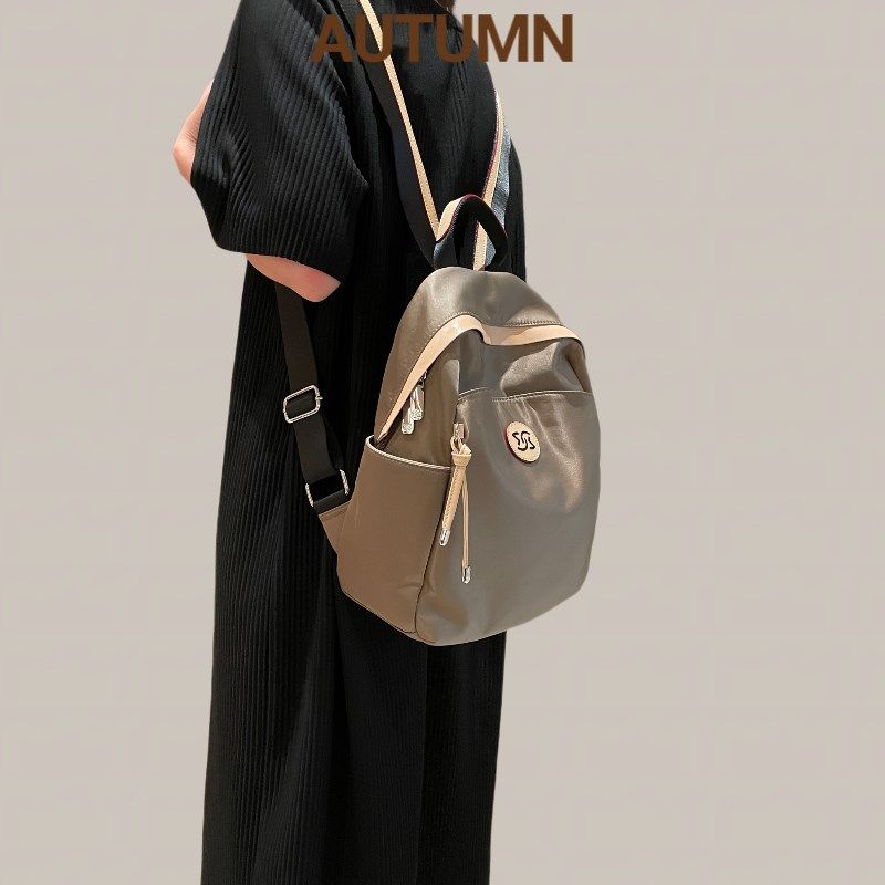 时尚小众旅行双肩包女2023新款休闲旅游牛津布女士揹包高级感书包