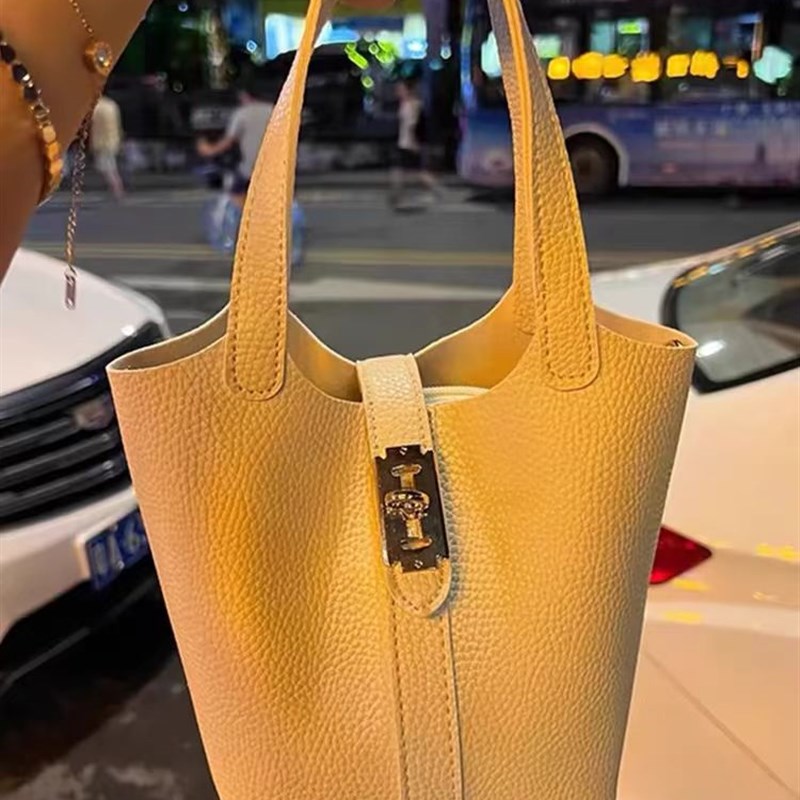 UR手提水桶包包女2024新款高级感小众时尚手拎菜篮子包单肩斜挎包