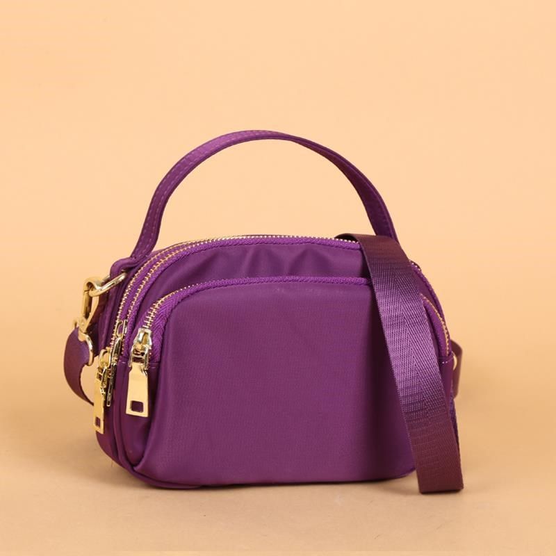 女2024新款轻斜挎包女帆布简约迷你手提中年妈妈小包女牛津布女包