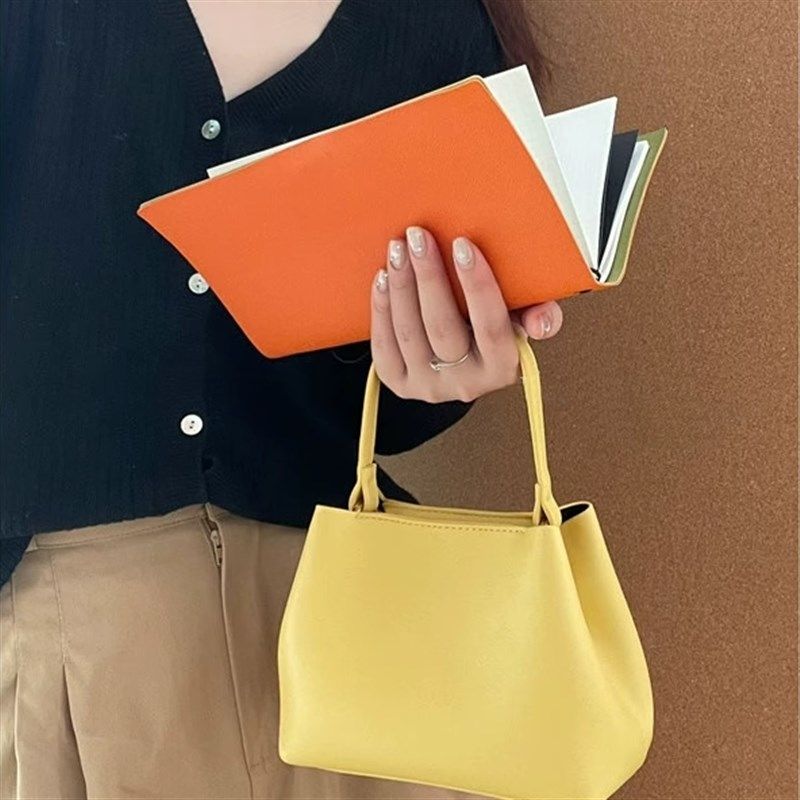 2025夏季新款草莓粉色斜挎女包水桶包手提包韩气质高级感单肩小包,箱包皮具/热销女包/男包,水桶包,淘宝优惠券,粉丝福利购,淘宝优惠卷