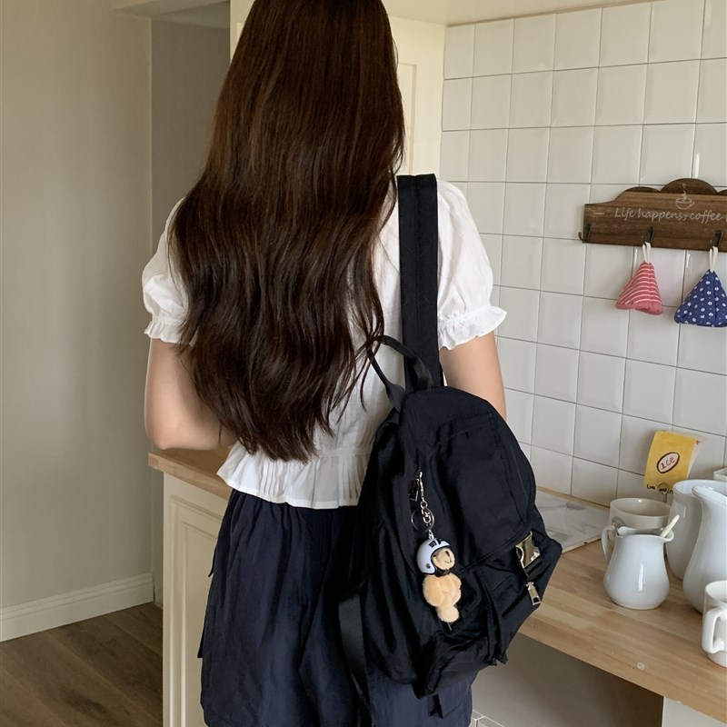 芝士商店~旅游轻便双肩包女设计感黑H色背包小众手提书包百搭包包