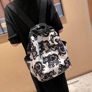 洋气大容量旅行双肩包女2024新款轻便时尚女士背包帆布外出旅游高