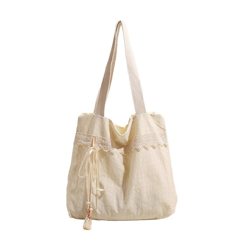 2024夏季新款文艺风手提包 蕾丝休闲布袋流苏时尚清新百搭单肩包