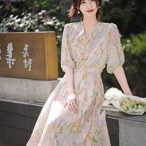 现货2023新款气质赫本风法式桔梗森系超J仙绿色雪纺碎花连衣裙子