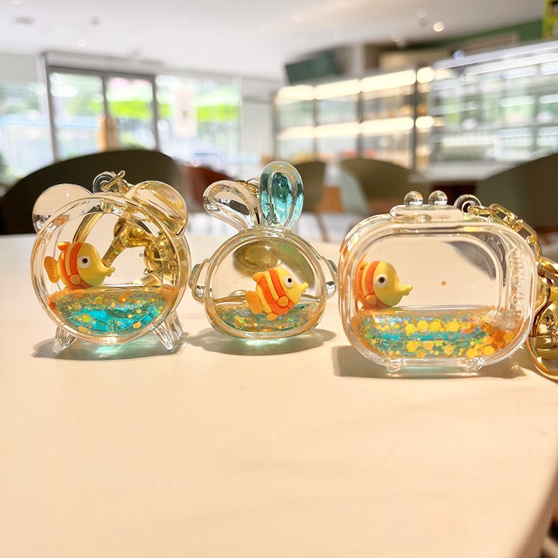 现货创意海洋小丑鱼入油流沙液体漂浮钥匙扣精致书包汽车挂件朋友图片