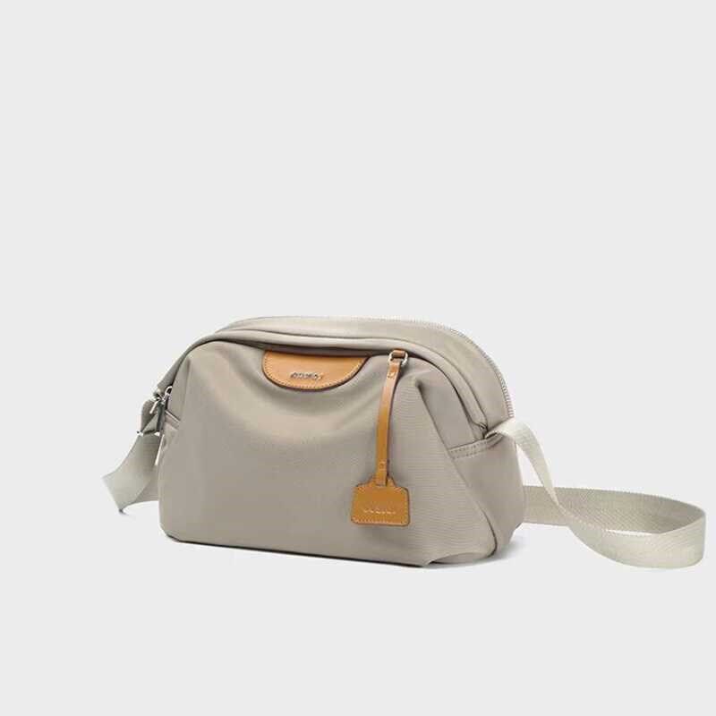 女包斜挎包女休闲轻便牛津布枕头包2024新款多层中老年妈妈单肩包