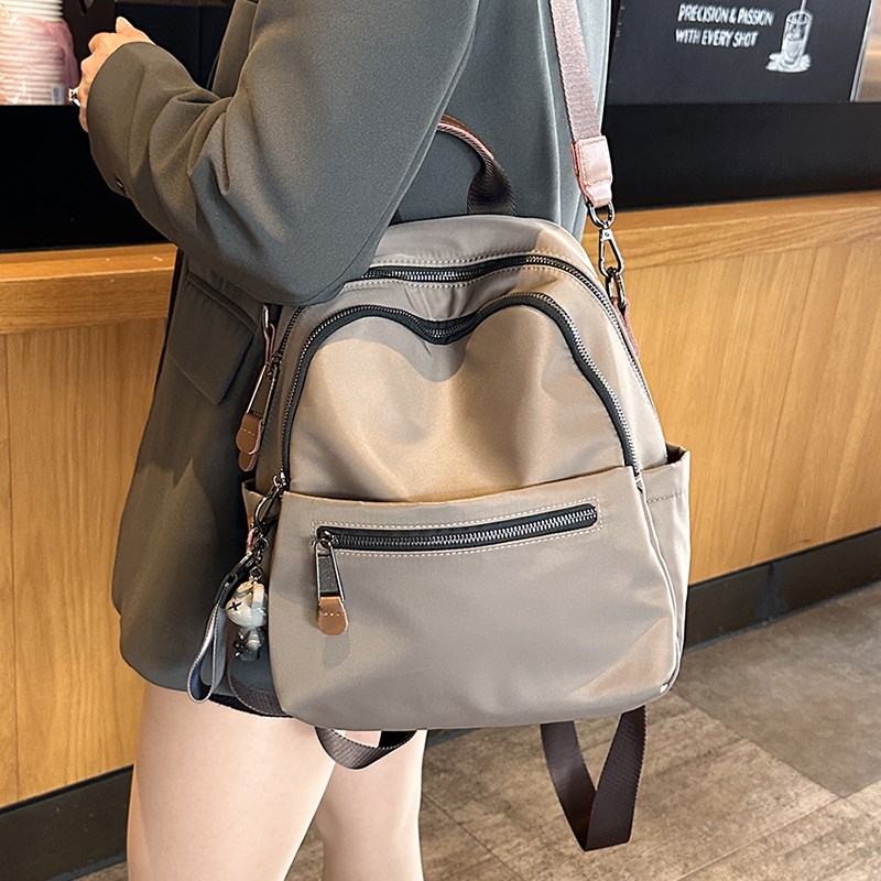 超轻便双肩包女高颜值2025新款百搭通勤包外出Q旅游牛津布背包书
