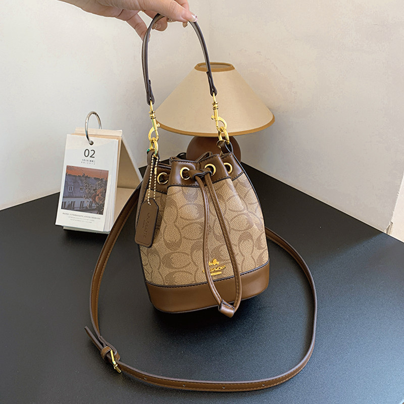 级感包包女2023新款时尚老花抽绳水桶包百搭洋气肩手提斜挎包,箱包皮具/热销女包/男包,水桶包,淘宝优惠券,粉丝福利购,淘宝优惠卷