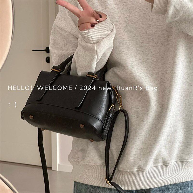 软软的包 韩版百搭软皮慵懒感枕头包简约手提斜挎包包女休闲黑色