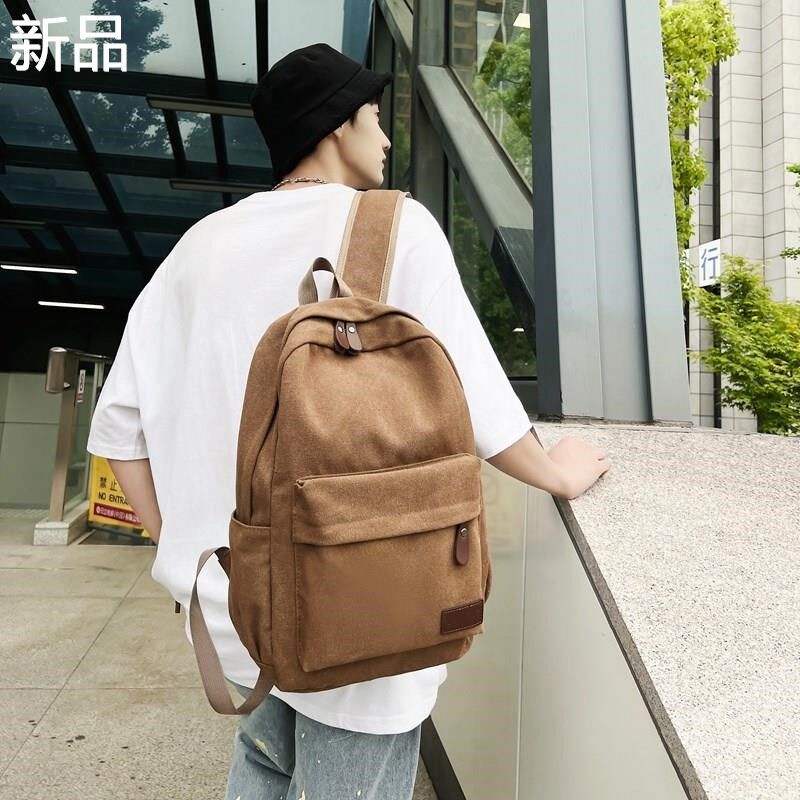 双肩背包男女加厚帆布包校园学简号生中书包约旅游电脑背包休新品