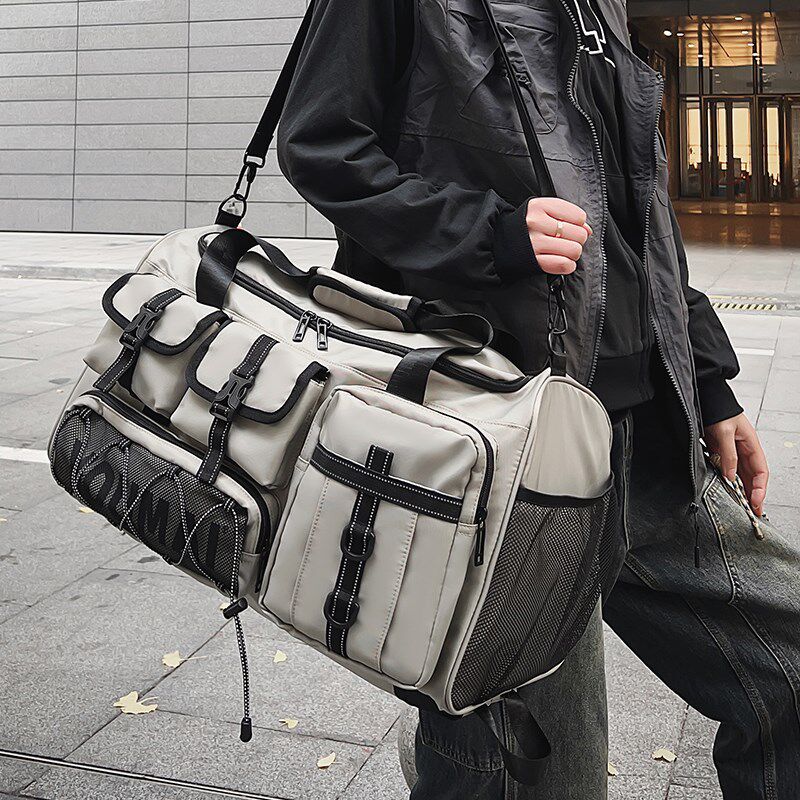 男士休闲旅游包短途外出旅行包轻便双肩包大容量黑包防水行李包男