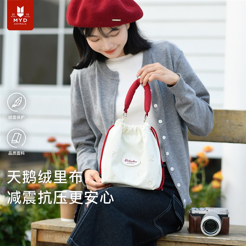 相机斜挎包女2025新款单肩小众可爱通勤旅行O大容量字母抽绳手提