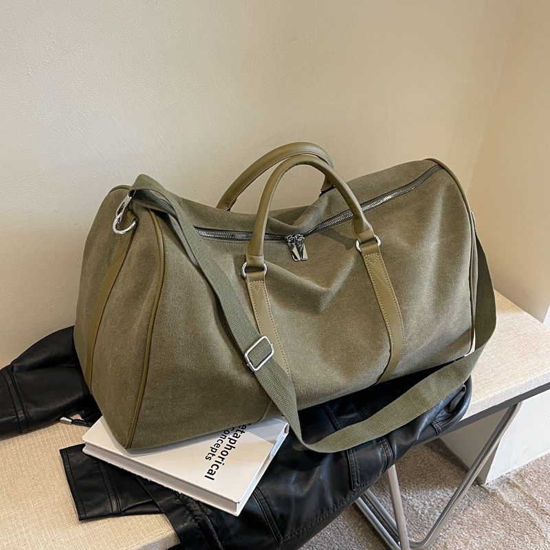 旅行包女手提帆布短途行李袋大容量男运动游泳健身包时髦利落耐用