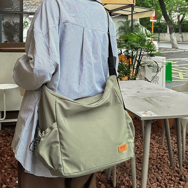 大容量帆布斜挎包女轻便收纳揹包休闲运动健身包单肩大学生邮差包,箱包皮具/热销女包/男包,通用款女包,淘宝优惠券,粉丝福利购,淘宝优惠卷