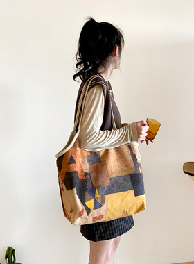 弘娜艺术家库尔特周边细肩带设计大容量帆布托特包女复古文艺背包