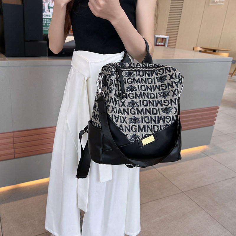 高级感小众双肩包女2023新款帆布印花背包时尚百搭大容量单肩包潮