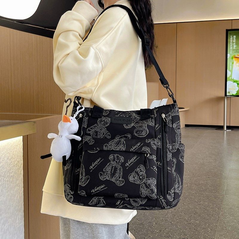 中小学生补习袋手提帆布书包男女儿童补课包单肩卡通斜挎包旅行包