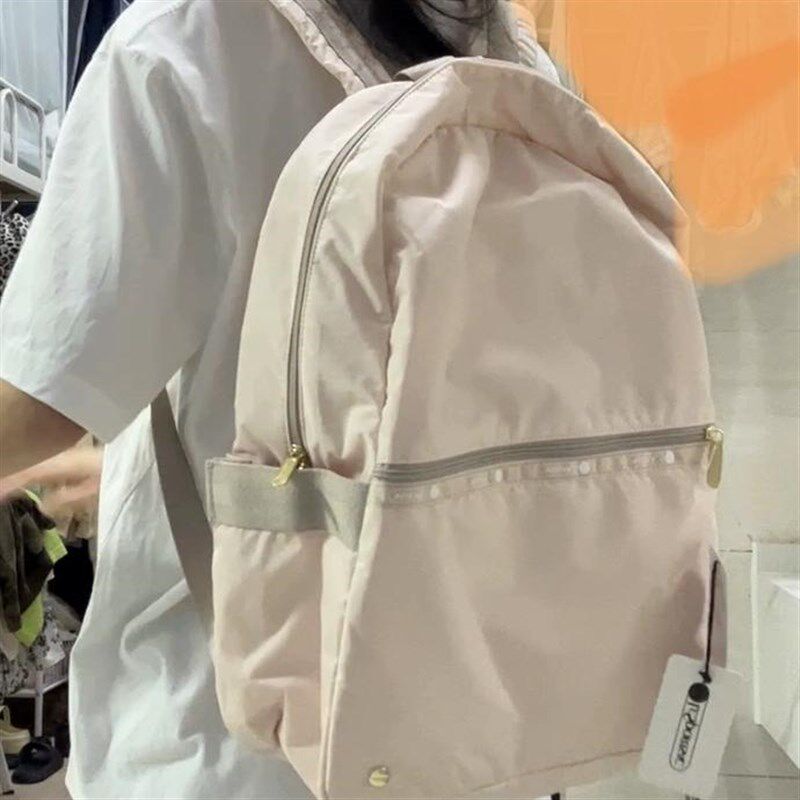 韩版防泼水双肩包大容量电脑包背包女多口袋大学生书包可套拉杆上