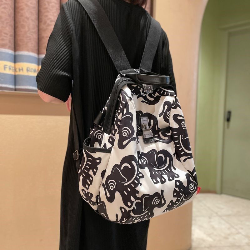 洋气大容量旅行双肩包女2024新款轻便时尚女士背包帆布外出旅游高