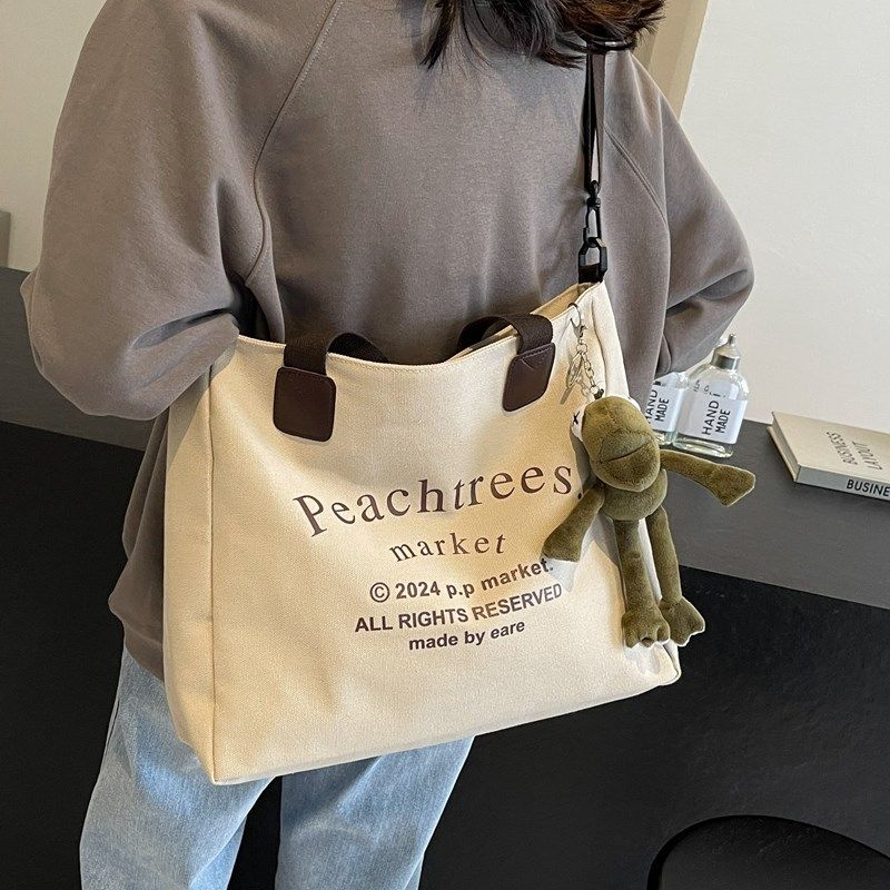 帆布包女2024新款大容量拎书袋学生补习托特单肩斜挎包手提布袋子,箱包皮具/热销女包/男包,通用款女包,淘宝优惠券,粉丝福利购,淘宝优惠卷