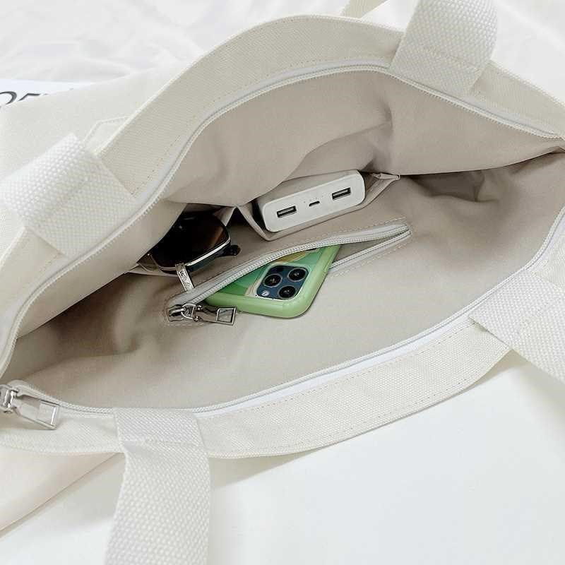 帆布包女单肩斜挎2022新款手提袋装书大容量学生上课简约百搭文艺