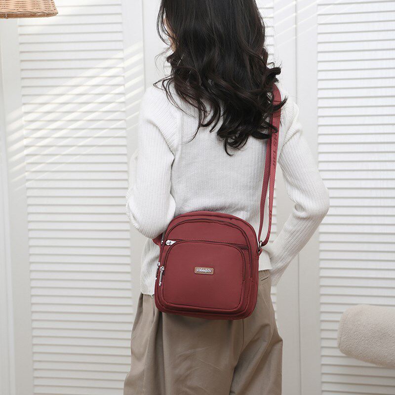 新款包包女2023年爆款高级感秋冬牛津布斜挎包简约多层尼龙单肩包
