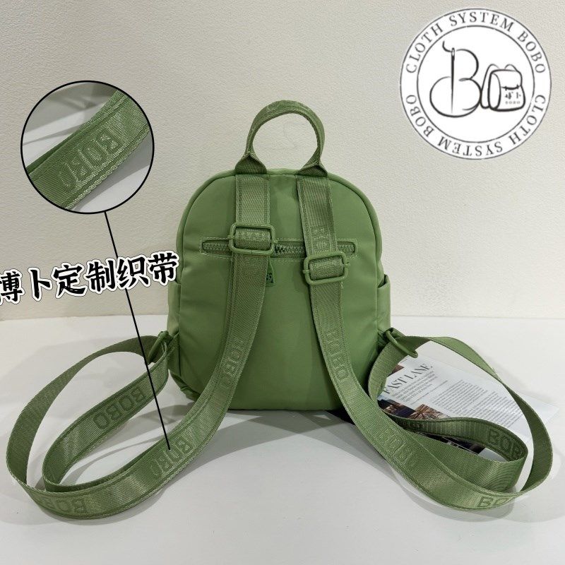 新款小型女双肩包精致防水旅游通勤时尚百搭尼龙洗水布包小号背包