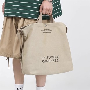 通勤斜挎包男款高级感小众单肩帆布包男大学生上课手提包可放电脑
