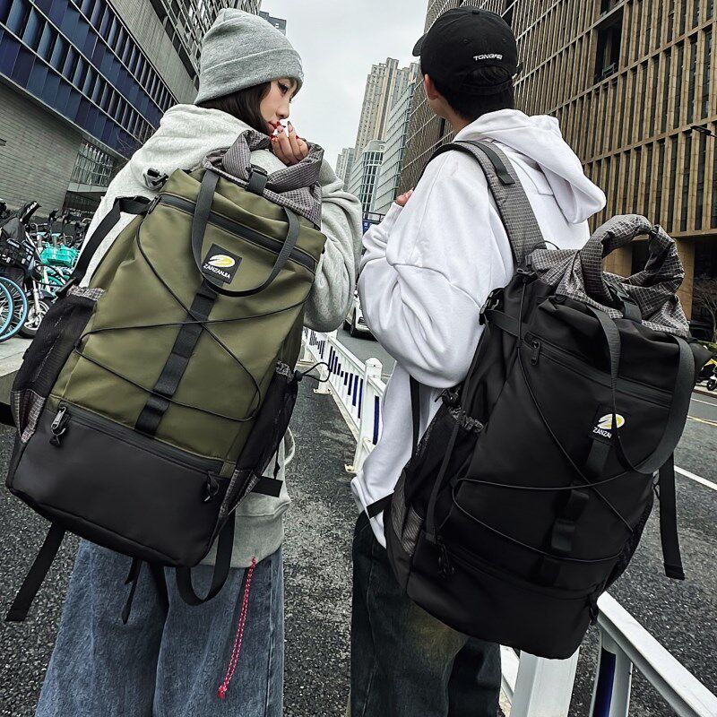 潮酷大容量双肩包男生撞色个性户外旅行登山背包休闲大学生书包女