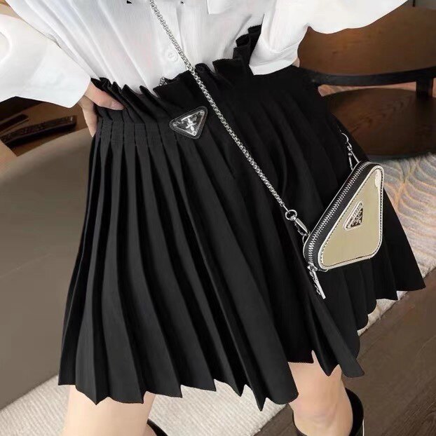 欧洲站2025春款三角标百褶裙女士高腰显瘦短裙包臀a字纯色半身裙