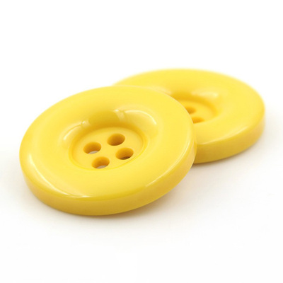 纽扣专卖黄色四眼圆边