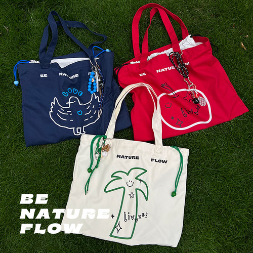 米花之岛原创慵懒风文艺单肩帆布包大容量印花托特包通勤手提包