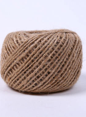 Bake a birthday cake with hemp string around it and wrap a m