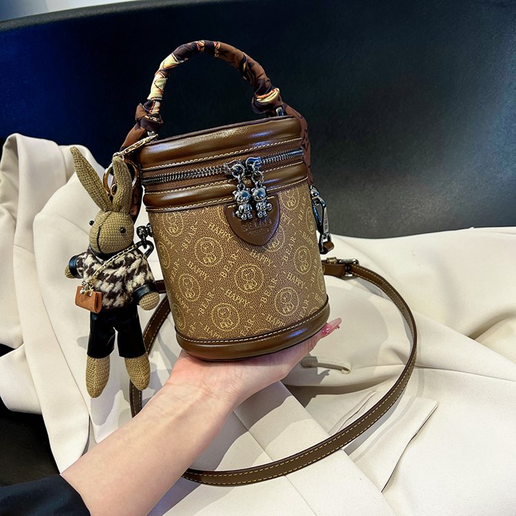 百搭手提包北包包斜挎包水桶包