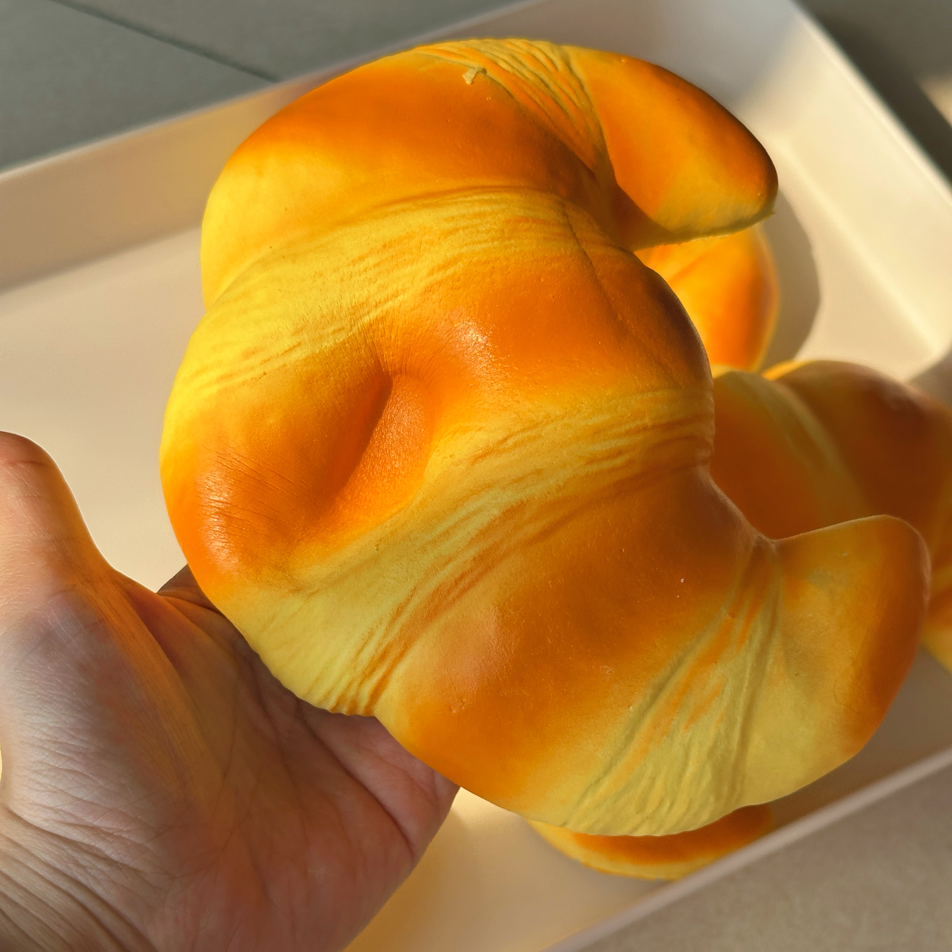 新品仿真大牛角包慢回弹squishy解压玩具仿真食玩面包送包装袋