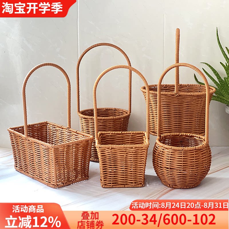 仿藤编手提鲜花绿植花篮图片