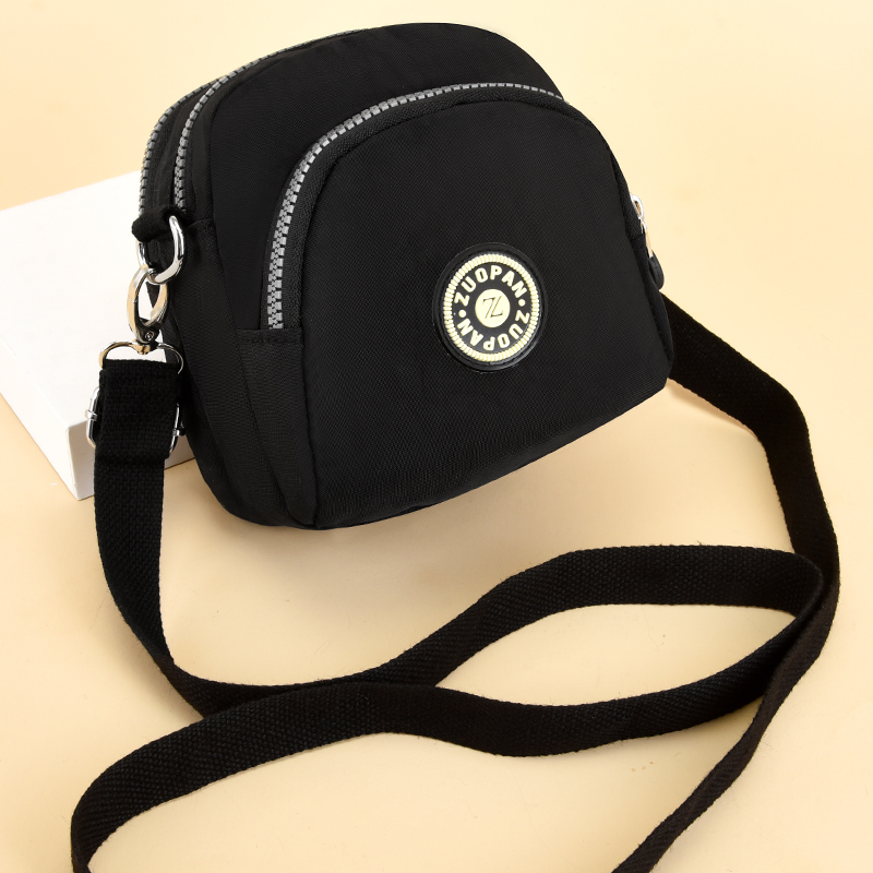 包包女新款防水多功能手机斜挎包