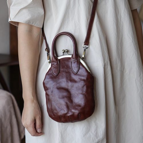 复古植鞣头层牛皮夹子口金包女